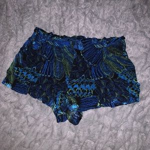 Peacock colored beach shorts